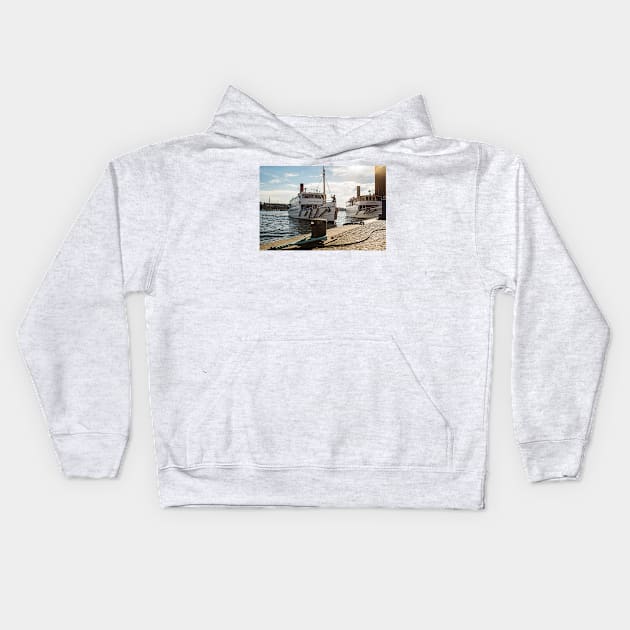 An old steamboat  in the Swedish archipelago arrives at the pier in Stockholm Kids Hoodie by connyM-Sweden